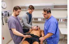 KCU students practicing POCUS with Dr. Arnce 